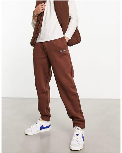 Champion Joggers marrones unisex con logo pequeño - Marrón