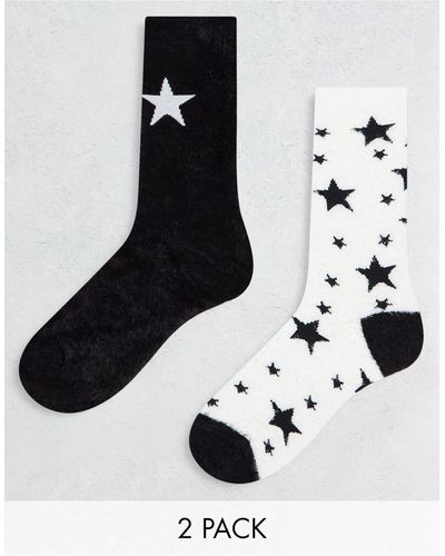 Threadbare Confezione da 2 paia di calzini morbidi neri e color crema con stelle - Nero
