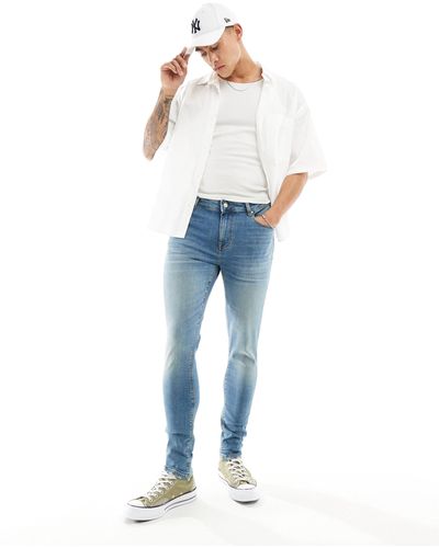 ASOS – hautenge jeans mit power-stretch - Grün