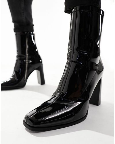 ASOS – chelsea boots aus lackleder mit hohem absatz - Schwarz