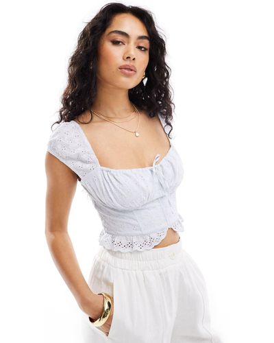 Hollister Top stile corsetto celeste con maniche ad aletta - Bianco