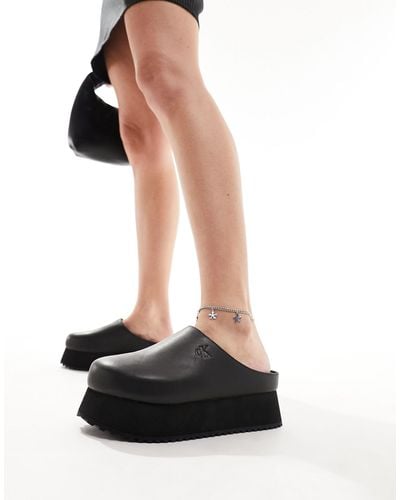 Calvin Klein Closed Toe Flatform Mules - Black