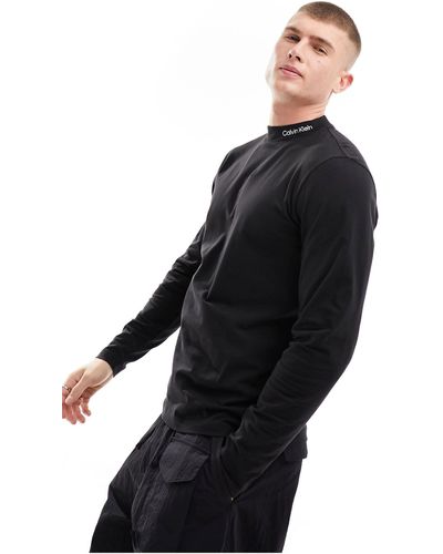 Calvin Klein – langärmliges shirt mit logo und hohem kragen - Schwarz