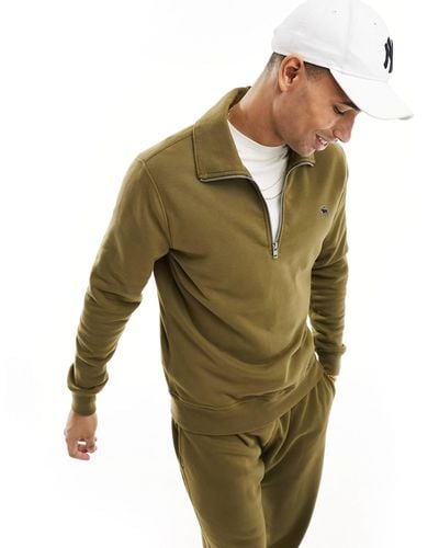 Abercrombie & Fitch – sweatshirt aus olivem frottee mit halbem reißverschluss und silikon-markenlogo, kombiteil - Grün