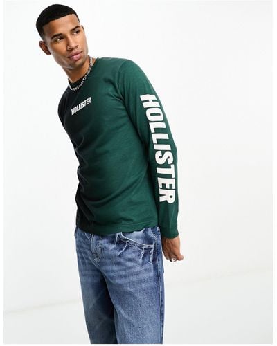 Hollister Maglietta a maniche lunghe e nera con logo verticale sulla manica - Verde