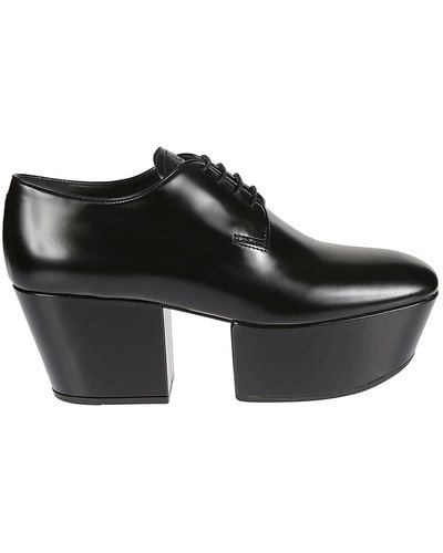 Prada Mocasines de plataforma de cuero - Negro