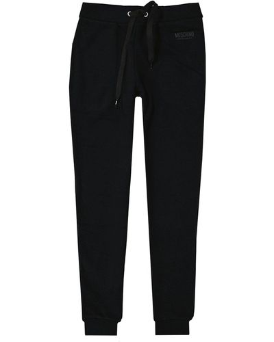 Moschino Pantalones de chándal con ropa interior de ropa interior moschino - Negro