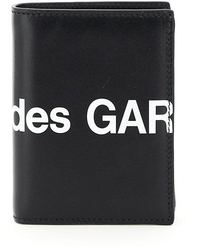 Comme des Garçons Portefeuille Comme des garçons petit portefeuille à deux volets avec un énorme logo - Noir