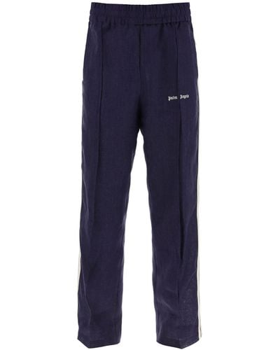 Palm Angels Joggers de lino con rayas laterales - Azul