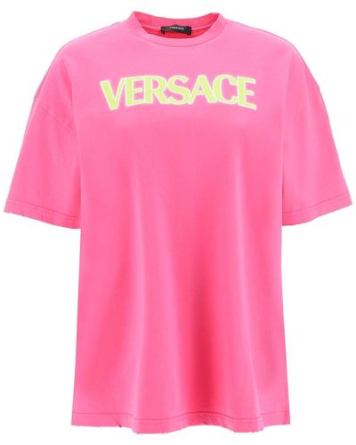Versace Distressed T -Shirt mit Neon -Logo - Pink