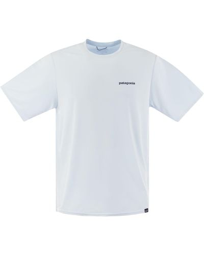 Patagonia T -Shirt im technischen Stoff mit Druck auf der Rückseite - Weiß