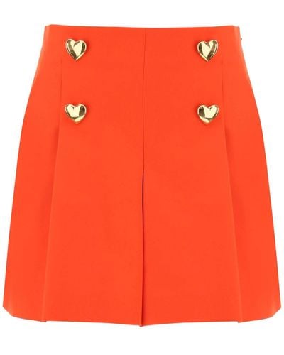 Moschino Pantalones cortos de mosquino con botones con forma de corazón - Naranja