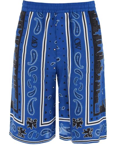 Off-White c/o Virgil Abloh Fuera de pantalones cortos de bermudas blancas con patrón Paisley - Azul