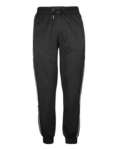 Givenchy Pantalones con logo de - Negro