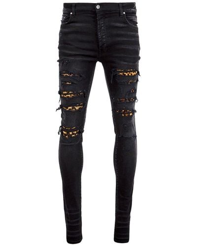 Amiri Jeans con estampado de leopardo - Negro