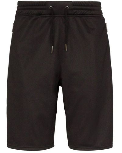 Givenchy Shorts de algodón con logo de - Negro