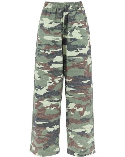 Acne Studios Camouflage Jersey Pants For Men - Green