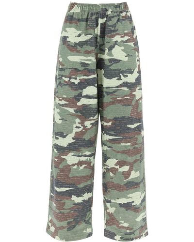 Acne Studios Camouflage Jersey Hosen für Männer - Grün
