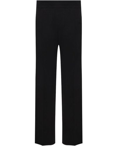 Versace Pantalones de algodón de - Negro