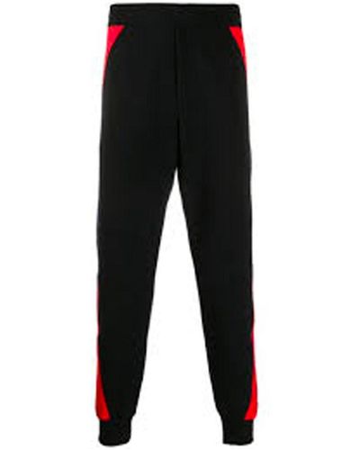 Alexander McQueen Pantalon de jogging avec patch logo - Noir