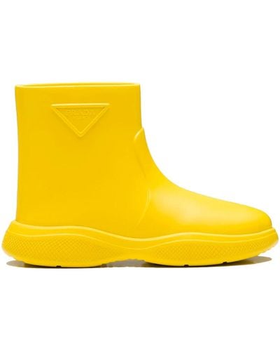 Prada Botas de goma del logotipo de - Amarillo
