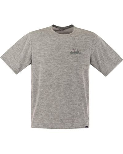 Patagonia T -Shirt im technischen Stoff mit Druck auf der Rückseite - Grau