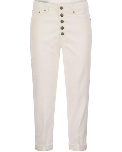 Dondup Koons pantaloni in velluto a strisce multipli con bottoni ingioiellati - Bianco