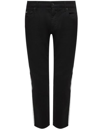 Dolce & Gabbana Jeans de rayas laterales de - Negro