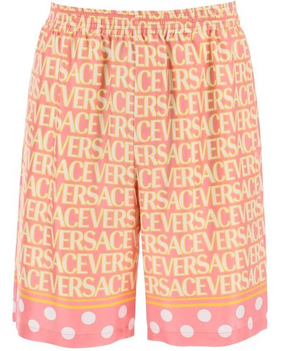 Versace Shorts in seta a stampa - Arancione