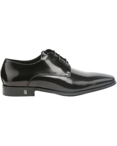 Versace V90320S VM00029 V000C Zapatos de cuero negro