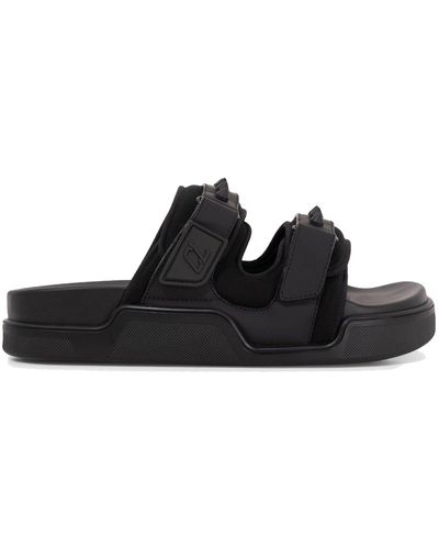 Christian Louboutin Sandalias de cuero con velcro de - Negro