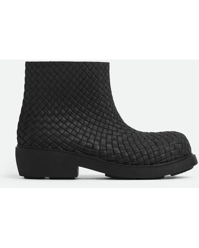 Bottega Veneta® Men's Haddock Boat Shoe in Black. Shop online now.