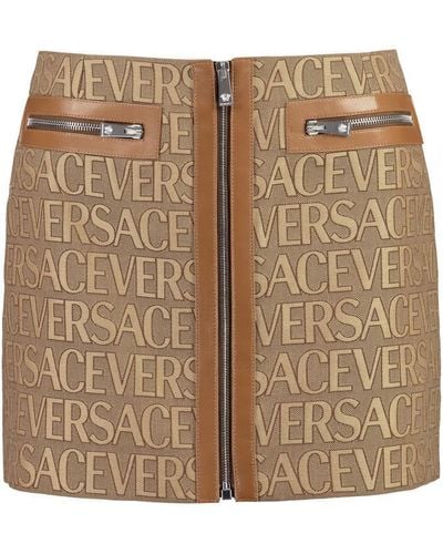 Versace La Vacanza Logo Canvas Leather-trim Zip-front Mini Skirt - Brown
