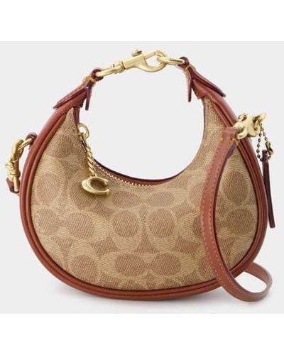 COACH Handbags - Brown