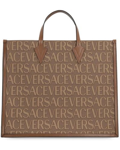 Versace Canvas And Leather Shopping Bag - Brown