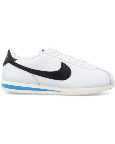 Women's Nike Cortez Leather Lux Casual Shoes (I want the black shoe with rose  gold swoosh)