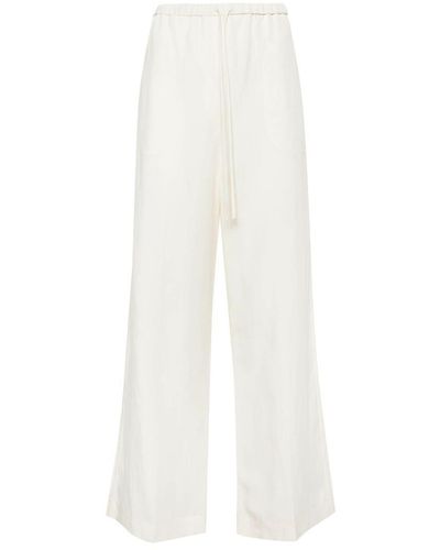 Toteme Wide Leg Pants for Women - Up to 70% off