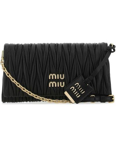 Shoulder bags Miu Miu - Black quilted leather mini bag - 5DH038N88002