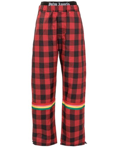 Palm Angels Trousers With Print - Red