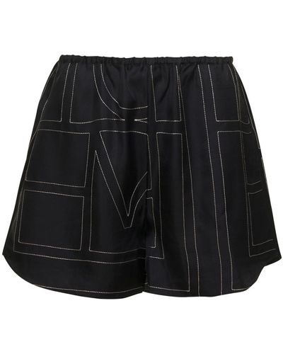 Totême Shorts With Geometric Logo Print - Black