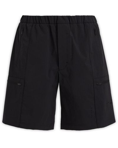 Givenchy Pleated Shorts, $887, farfetch.com