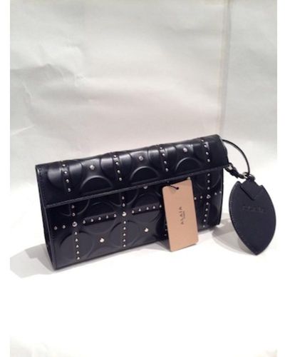 Shop Alaïa Louise 20 Perforated Leather Clutch