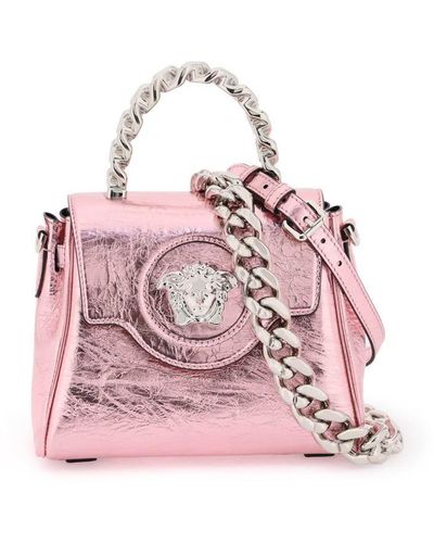 VERSACE: bag in hammered leather with Medusa - Pink  Versace crossbody bags  DBFI046 DVIT3T online at