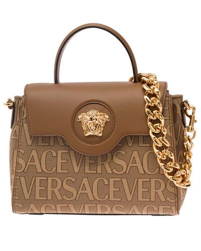 Versace Beige 'la Medusa' Hand Bag With 'all-over' Motif In Fabriìc Woman - Brown