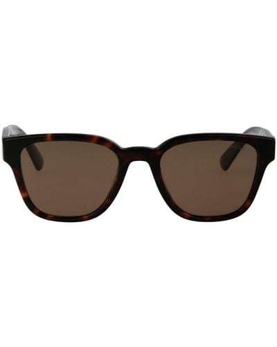 Prada Sunglasses - Brown