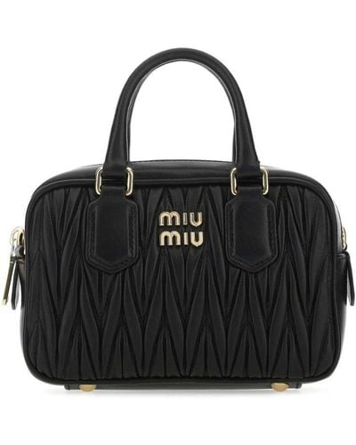 Miu Miu Matelasse Patent Leather Top Handle Flap Bag - FINAL SALE (SHF –  LuxeDH