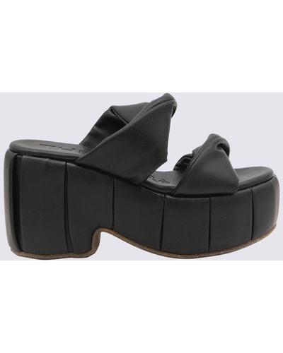 THEMOIRÈ Black Faux Leather Andromeda Sandals