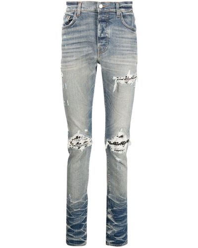 Amiri Distressed Skinny Jeans - Men's - Elastane/cotton/elastomultiester - Blue