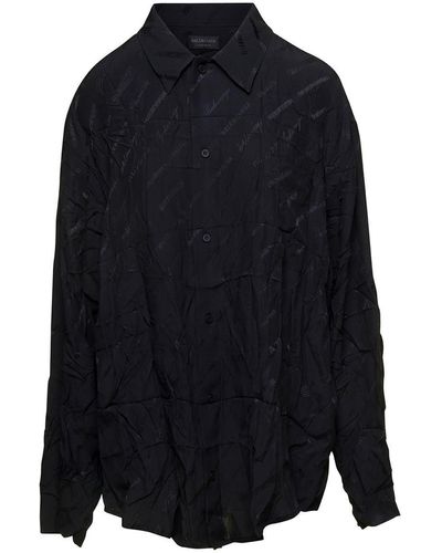 Balenciaga 'logomania' Black Oversized Shirt With All-over Print And Crinkled Effect In Silk Woman - Blue