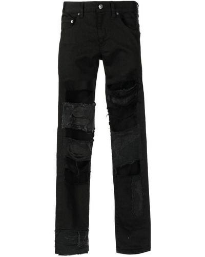 Undercover Distressed-effect Skinny-cut Trousers - Black